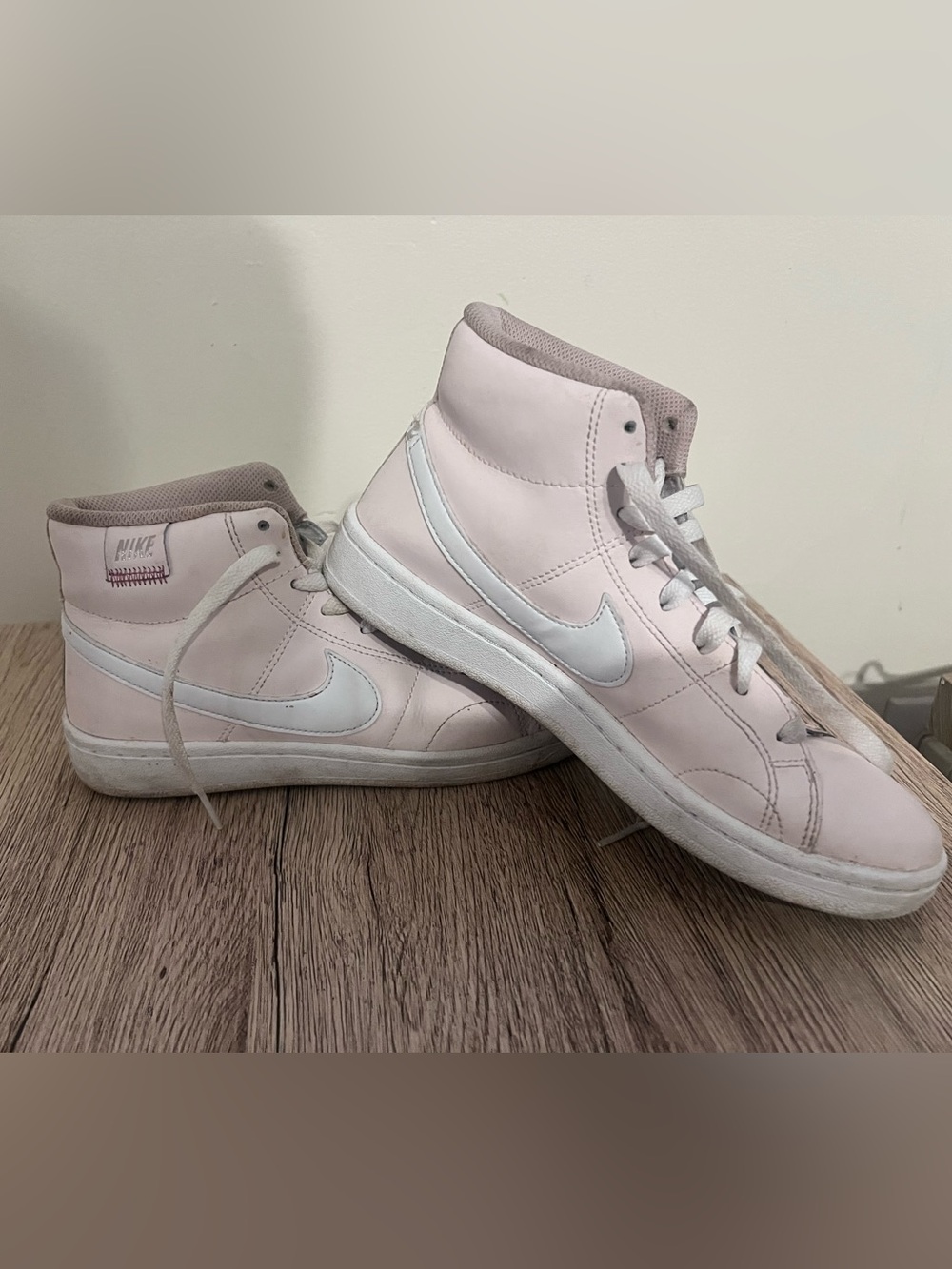 Nike Women's Light Pink High-Top Sneakers with White Swoosh